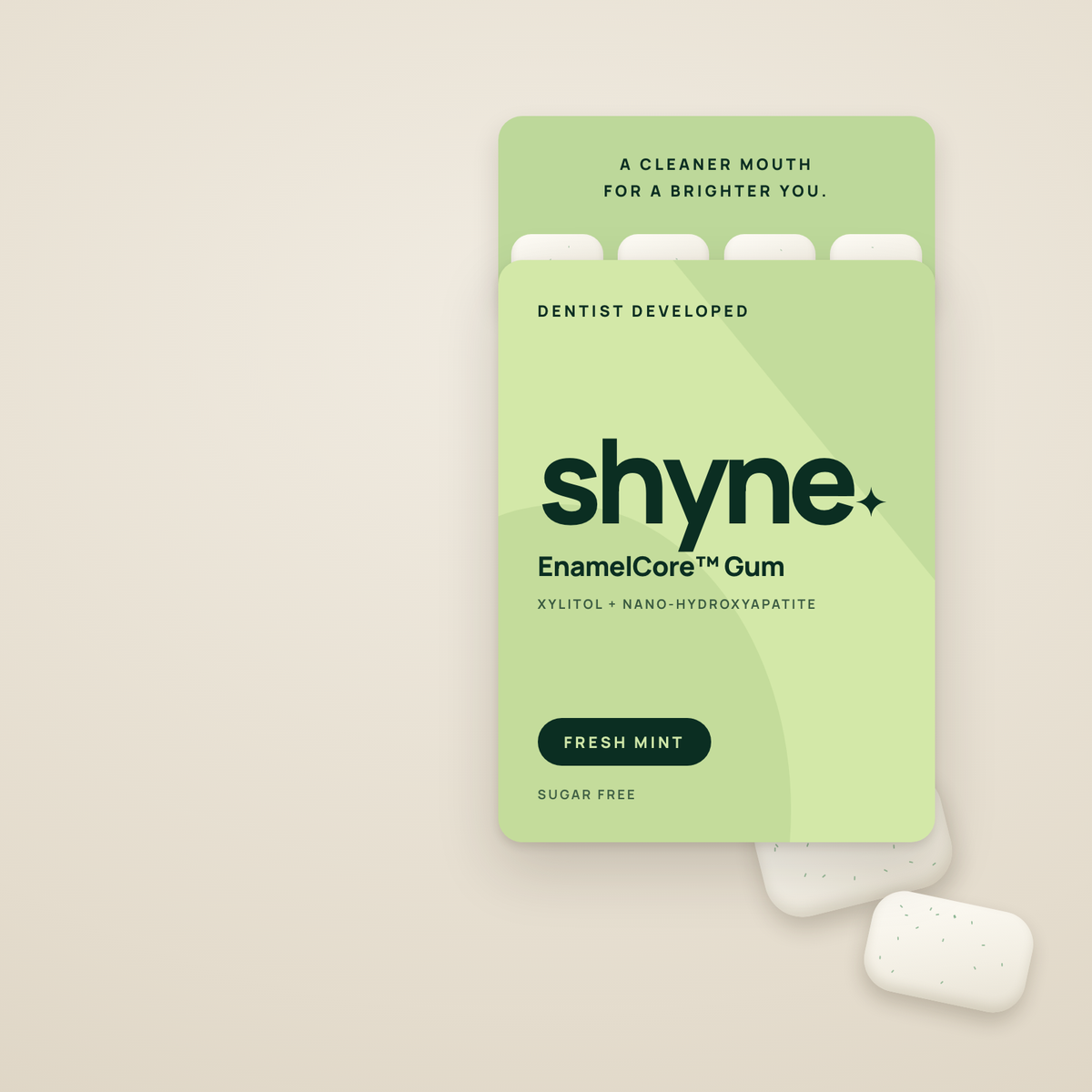 Open EnamelCore™ Gum pack in Fresh Mint with two gum pieces